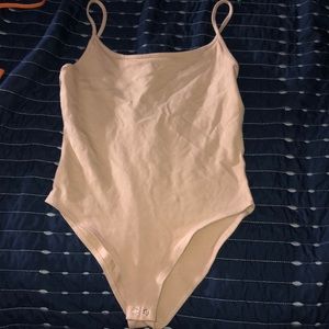 Body suit ( pinkish/nude) color